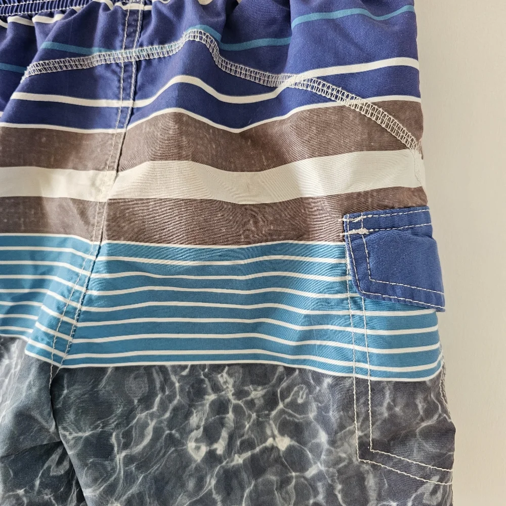 3T Quad Seven blue, gray and white swim trunks Vacation Spring Break beach shore